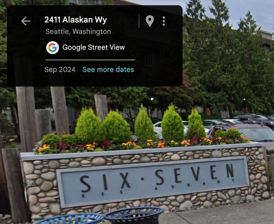 Google Street View screenshot of a sign for "Six Seven restaurant", Seattle, September 2024
