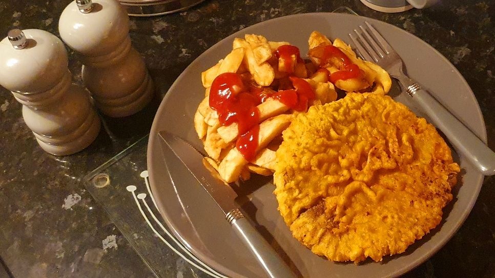 Pineapple fritter and chips 🍟 with tomato sauce 😋 