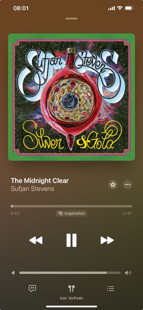 Apple Music screenshot showing Sufjan Stevens' song The Midnight Clear playing. Album: Silver & Gold.