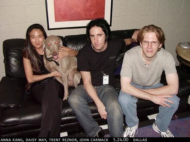 Photo of Anna Kang, a dog named Daisy May, Trent Reznor, and John Carmack. It's dated 5.24.2000, Dallas, Texas.