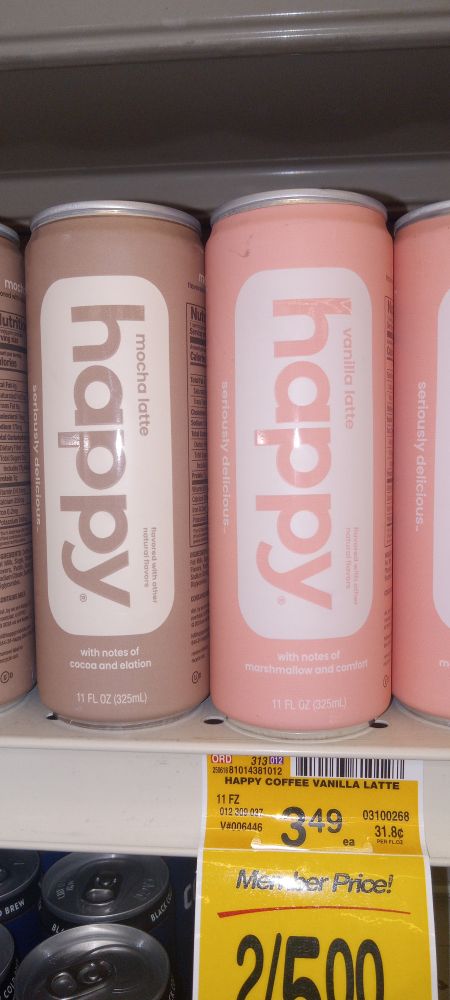 A coffee brand named "happy" with two cans colored one light brown and one light pink