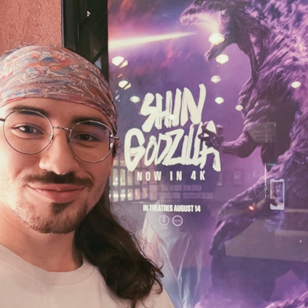 same fit in front of SHIN GODZILLA poster