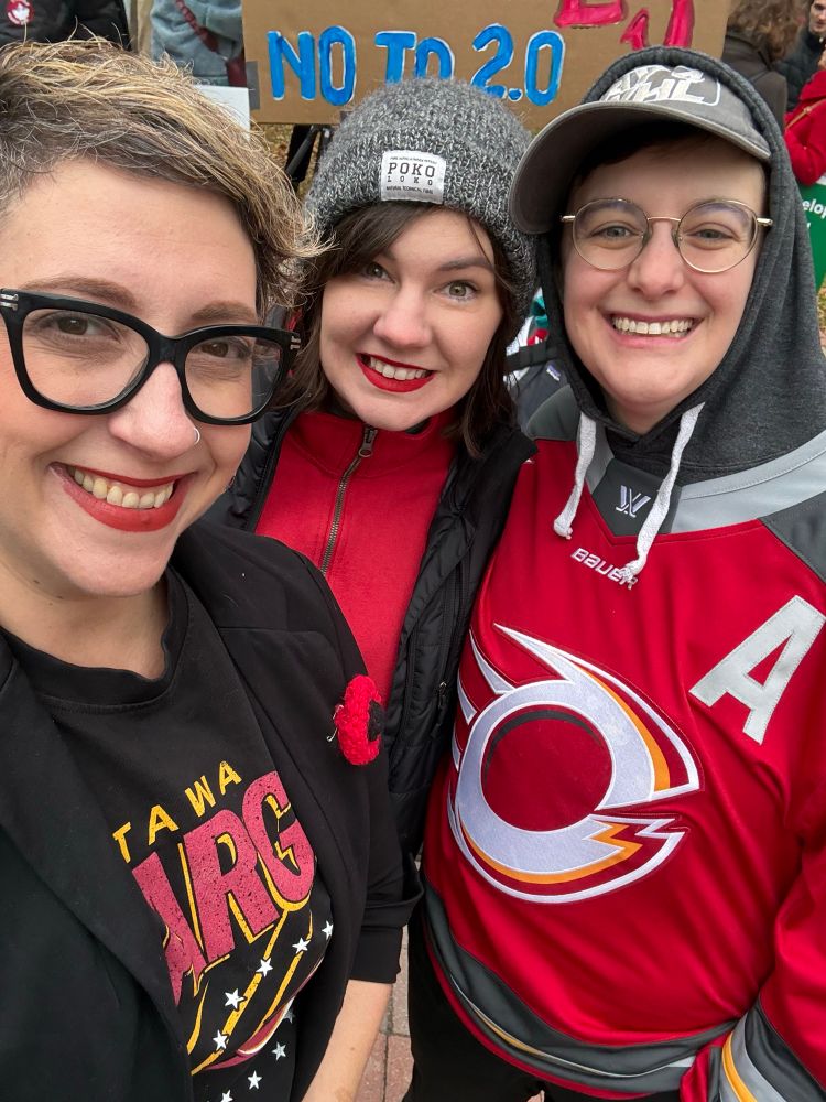 Ariel with two Ottawa Charge fans in their uniforms 