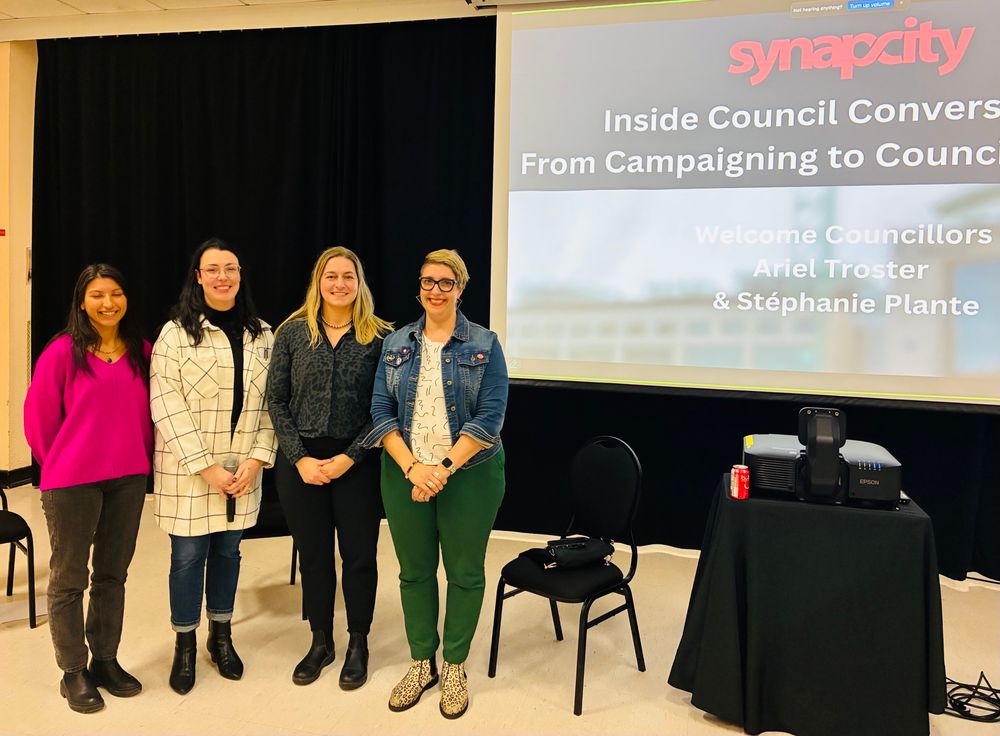 Ariel and Stephanie Plante with board members from Synapcity