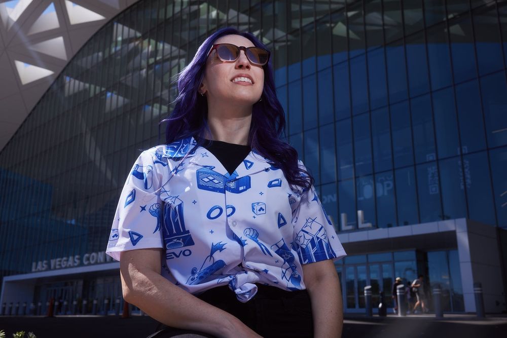 A woman in sunglasses in Evo apparel