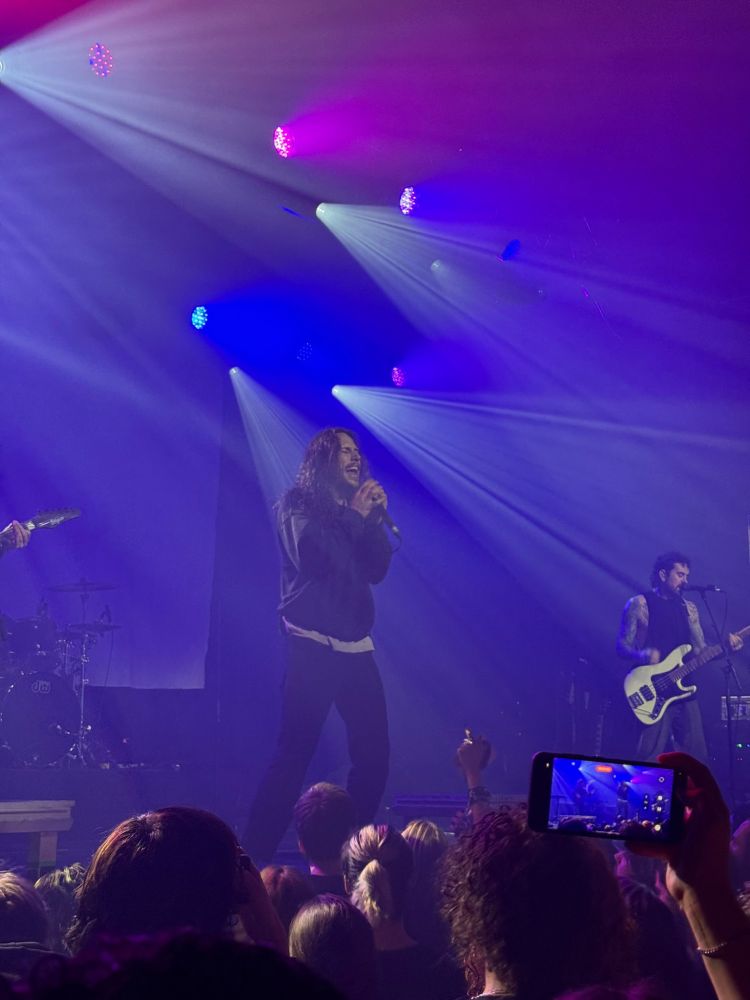 Shot of Silent planet performing on stage.