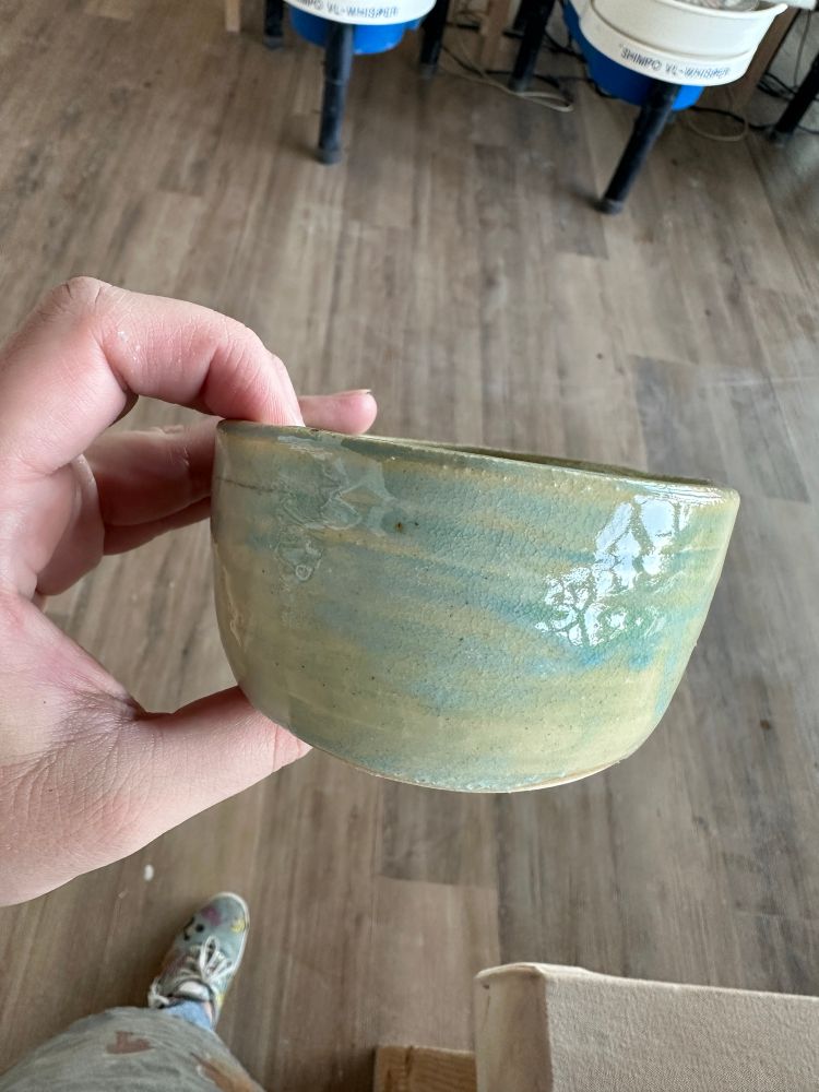 White bowl with blue water glaze