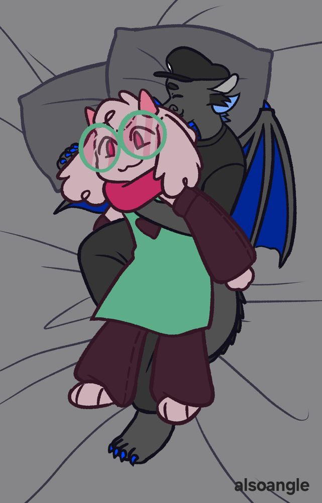Red snuggling a huge Ralsei plushie