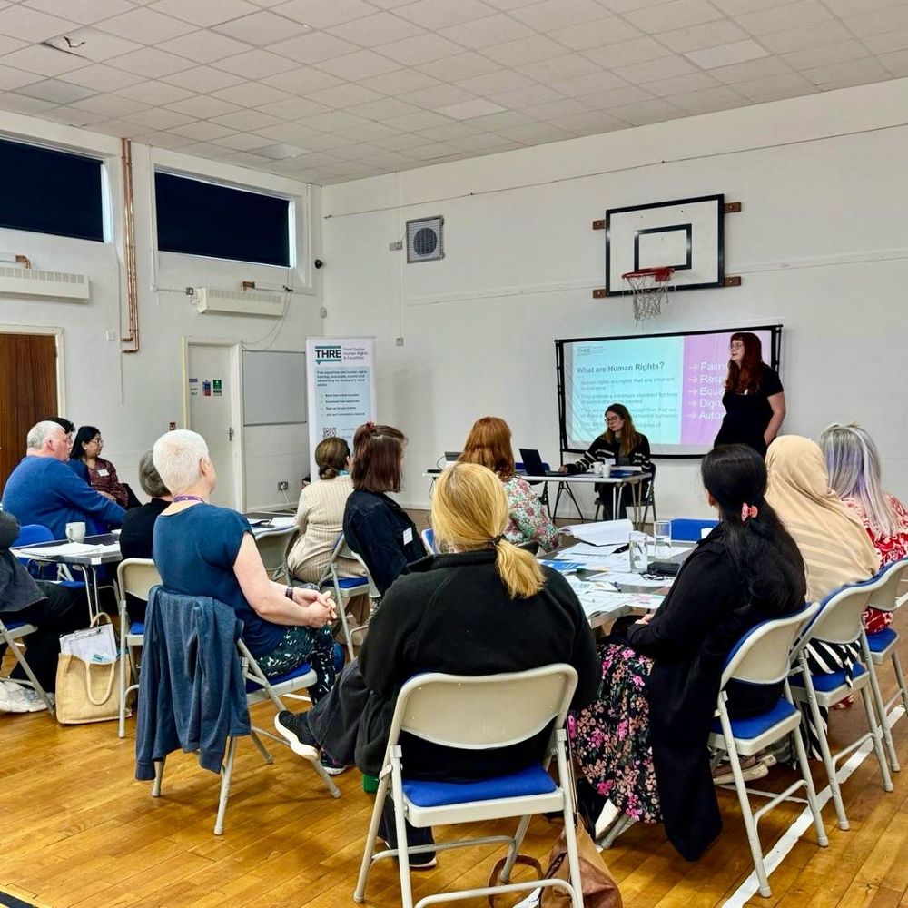 Alice and Olivia presenting to as part of the Safer and Empowered Communities Forum
