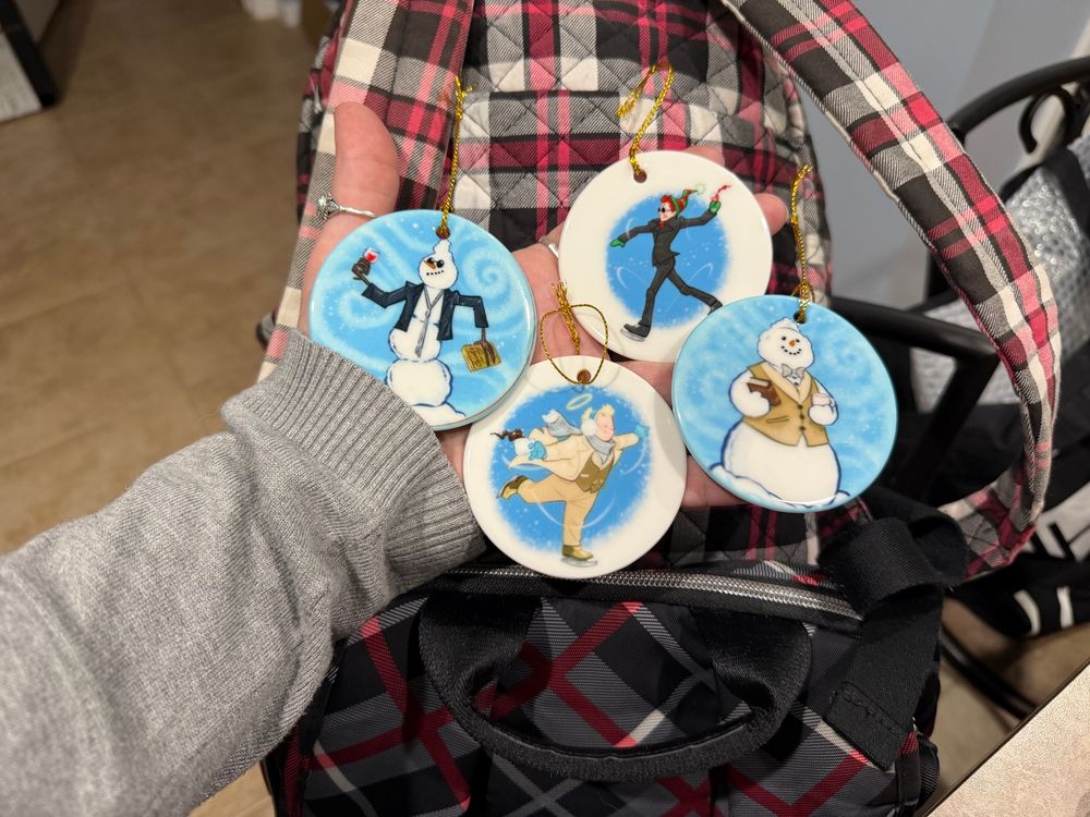 Gleafer Christmas ornaments! From left to right, top to bottom: Snowman Crowley, Crowley about to let loose a snowball, a graceful Aziraphale ice skating with a mug of hot cocoa, and Snowman Aziraphale.