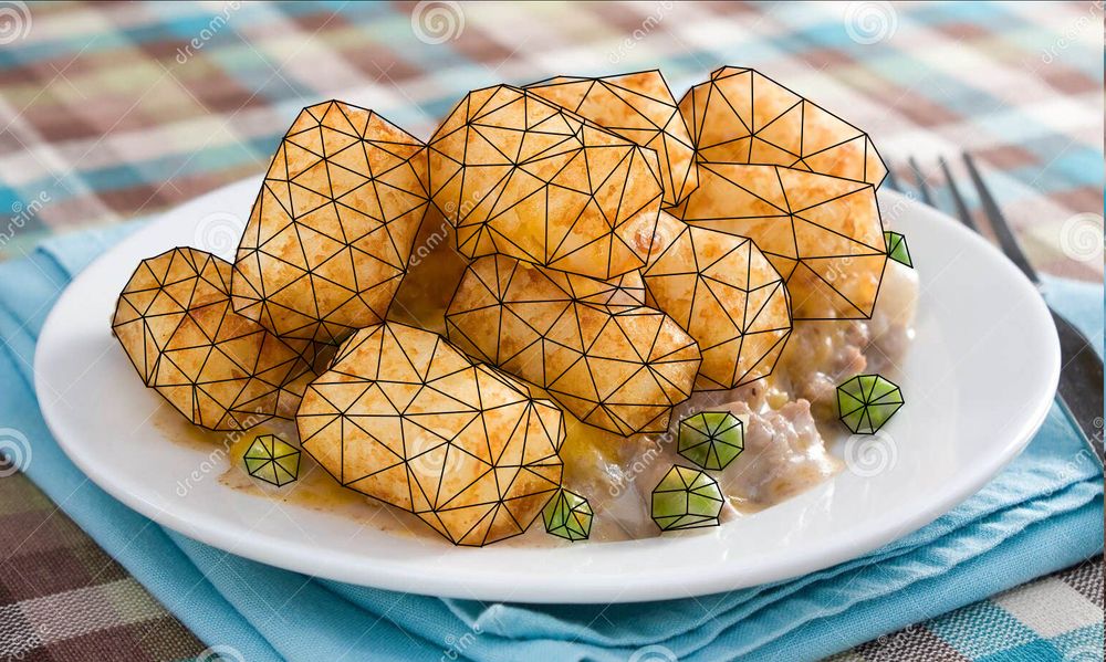 A plate of tater tots and peas, with wireframes drawn over them.