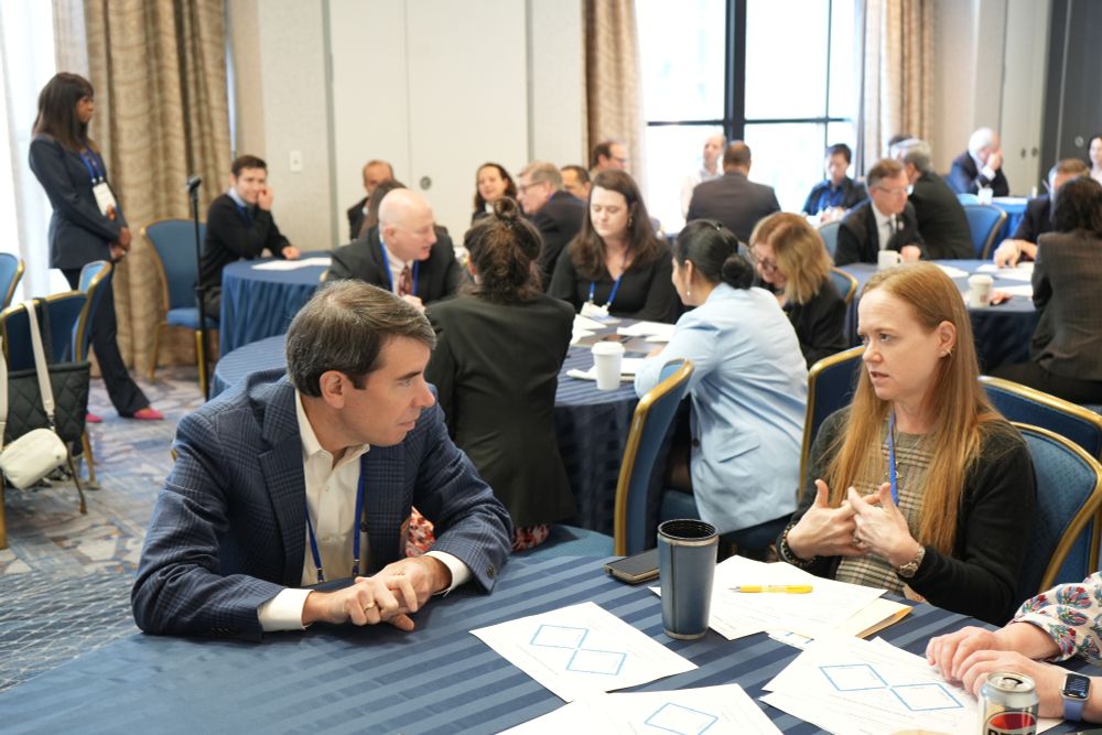 Attendees engaging in an #AUPN2025 session