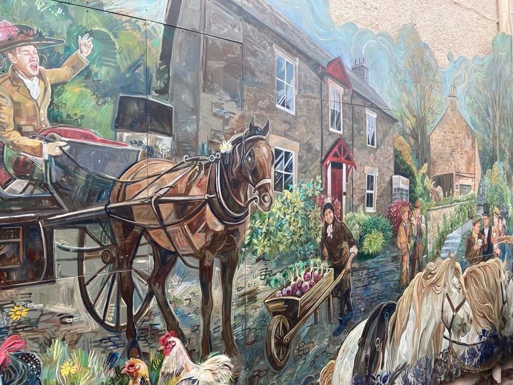 A mural depicting scenes from Victorian Colinton, featuring a horse and cart.
