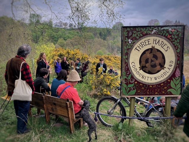 Visitors gather at Three Hares Community Woodland to celebrate the opening of the new Poetry Trail