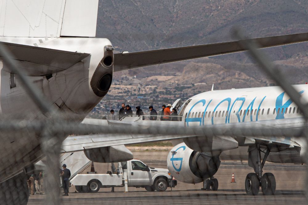 Ten unaccompanied minors walk off an ICE deportation plane at the El Paso International Airport on Sunday, Aug. 31. They walked off the plane about an hour after a judge in DC ordered that they could not be deported. 