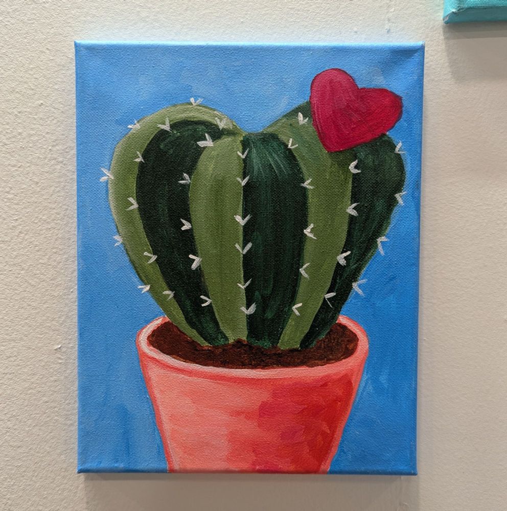 Acrylic painting on canvas of a heart-shaped potted cactus with a heart-shaped flower blooming from the top. 