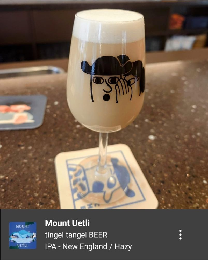 A beer with an oddly creamy, light-custard looking colour