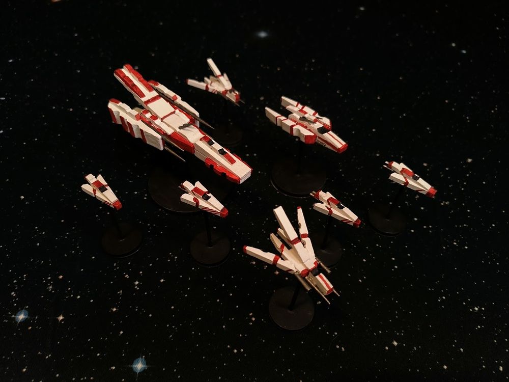 red and white clothespin spaceships.