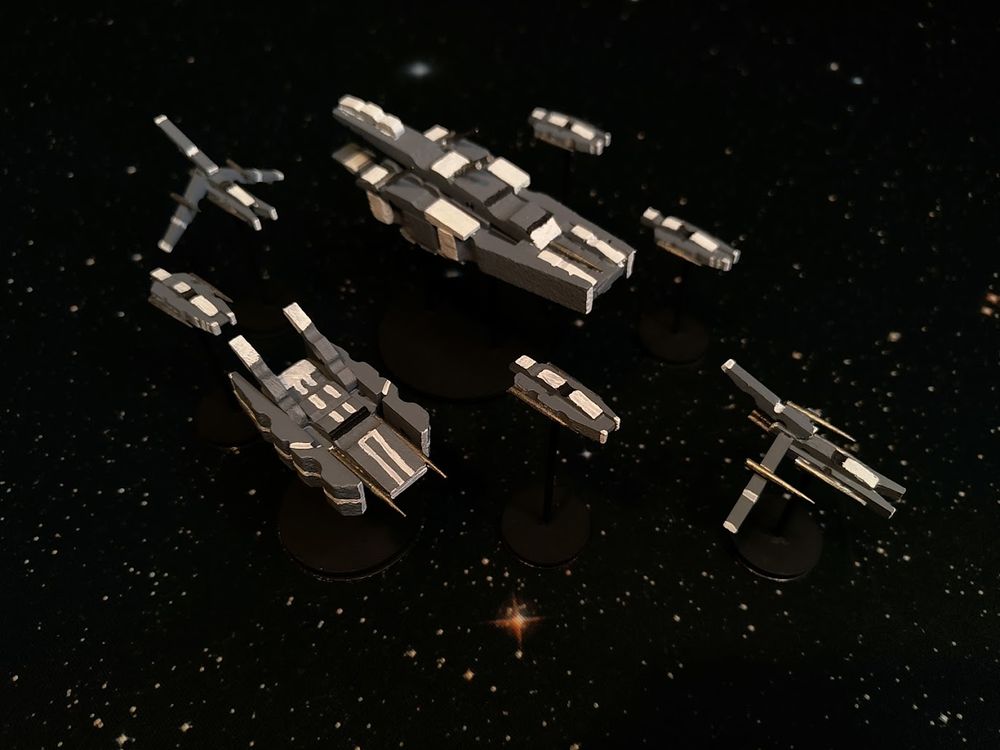 gray and white clothespin spaceships.