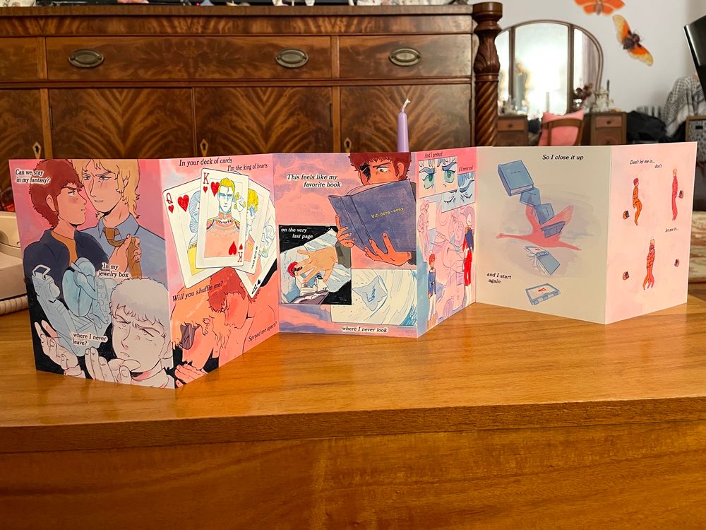 very pink 6 page comic about char and amuro printed as an accordion book 