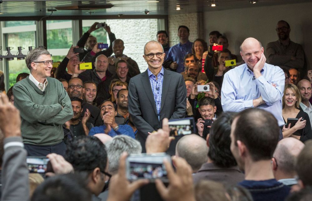 February 2014: Three generations of Microsoft CEOs celebrate as Steve Ballmer passes the baton to Satya Nadella. Satya began working at Microsoft in 1992 and ushered in an era of openness and innovation for the company. 