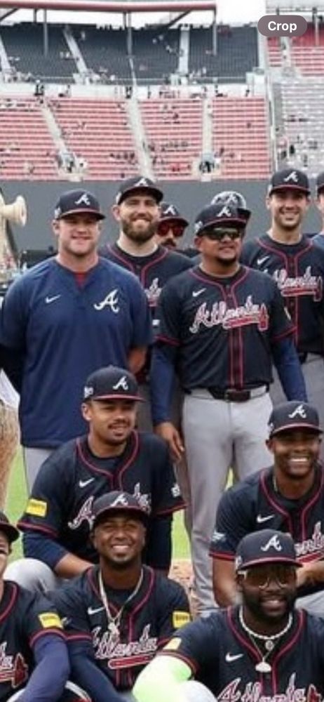 zooming in on the group speedway classic photo, behind dylan lee, is just 3/4 of the face of an expressionless Spencer strider with sunglasses on. 