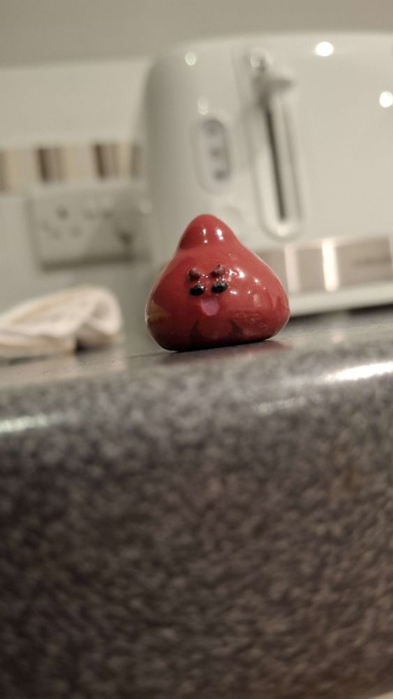 A 3D printed and painted figure of Ember from Hyper Team Recon in her slime form