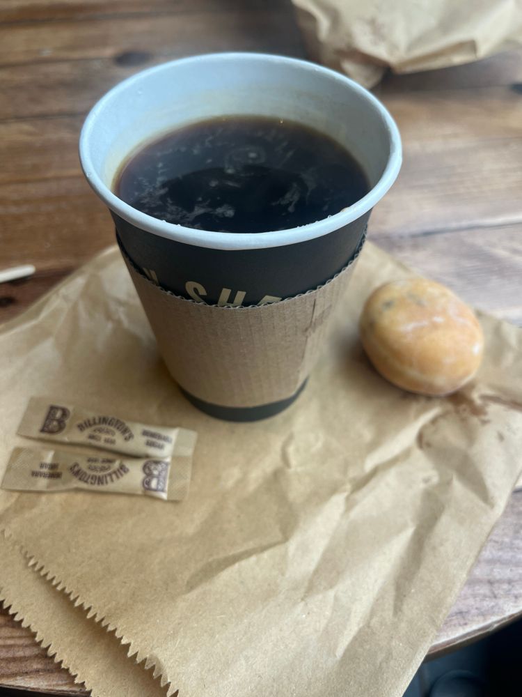 Americano and a mini donut. 