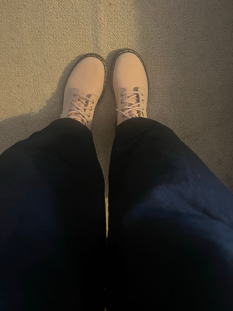 Pale pink Dr Martens. 