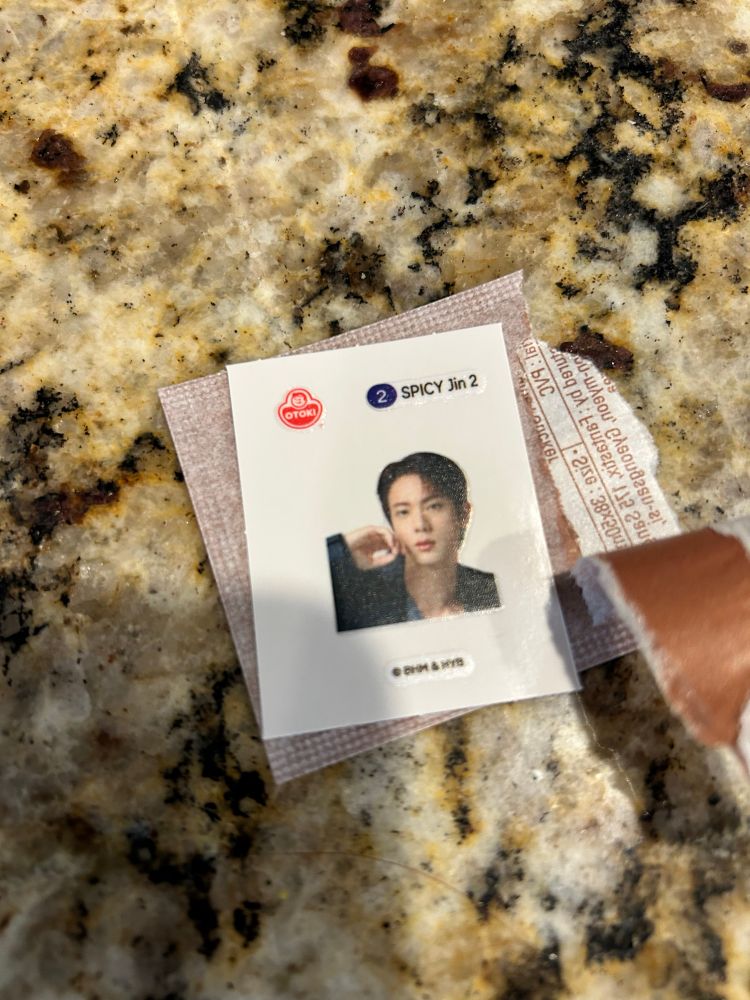 a sticker of jin from bts