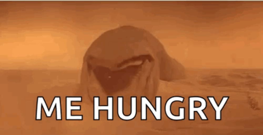 a picture of a shark with the words me hungry written below it