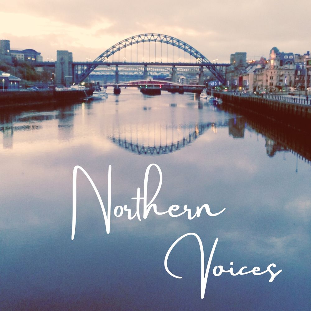 The Tyne Bridge is pictured in the centre of the frame over a still, reflective River Tyne in Newcastle, UK. Either side of the bridge are buildings with a warmer glow as the sun rises. The words Northern Voices in white lettering feature in the bottom centre of the image.