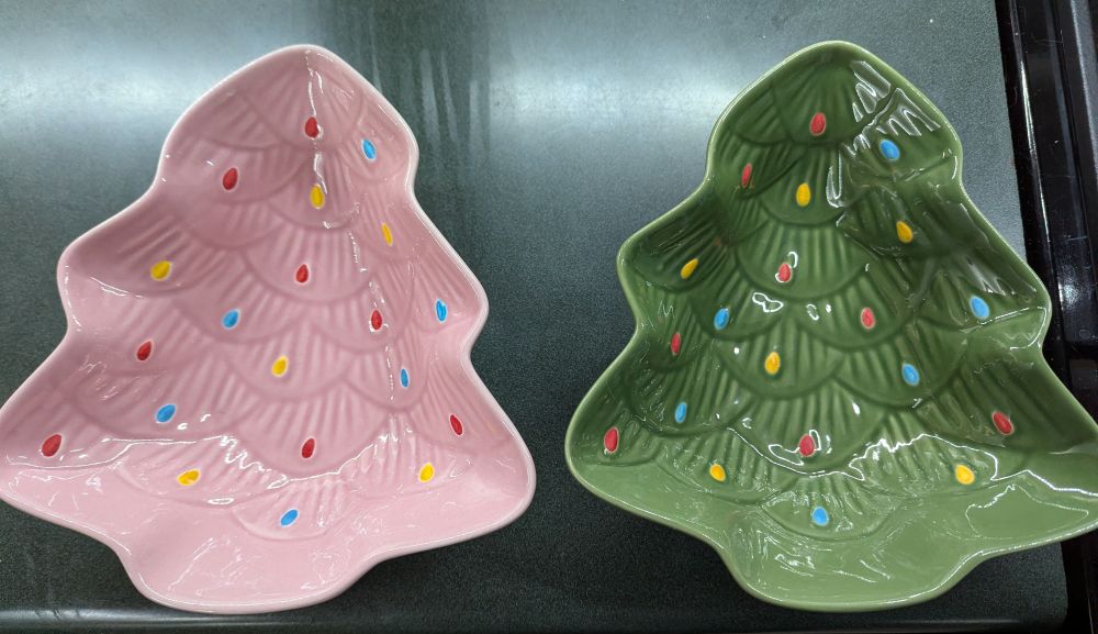 Pink and green ceramic bowls shaped like Christmas trees