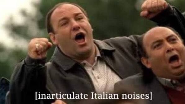Two Italians yelling with the text [inarticulate Italian noises]