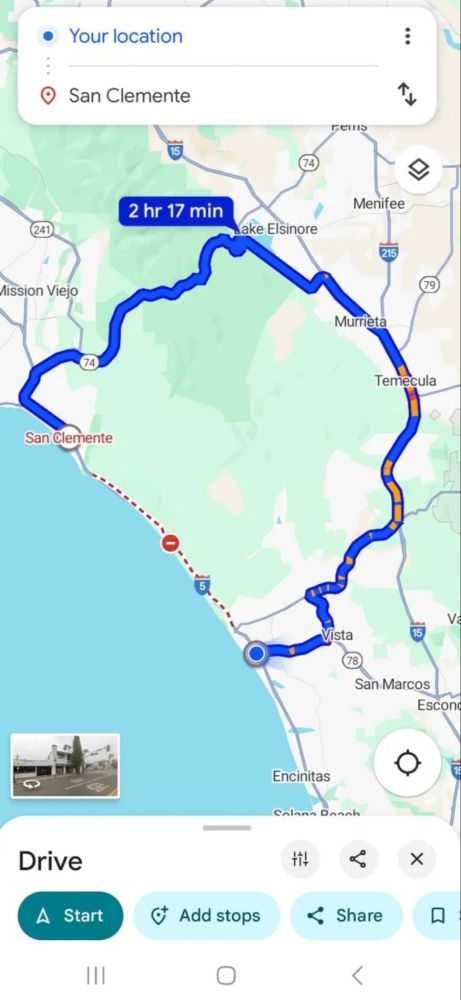 A map showing the estimated travel time from Oceanside to San Clemente as 2 hours and 17 minutes when it would normally be about 30 minutes.  The map also shows that the five freeway along Camp Pendleton is shut down due to a Trump ordered military demonstration involving live fire from a naval ship across the freeway into the marine base.