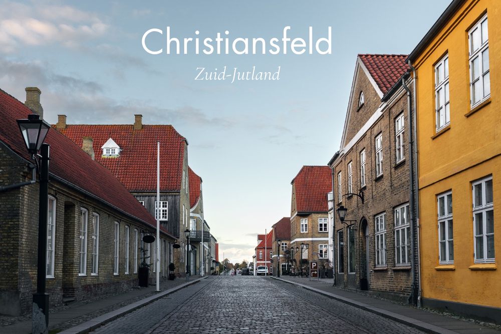 Christiansfeld is een symmetrisch gebouwd dorp in Zuid-Jutland, gesticht door de Evangelische Broedergemeente in 1773. Het staat op de UNESCO Werelderfgoedlijst vanwege zijn unieke protestantse stadsplanning. Het dorp is ook bekend om zijn traditionele honingkoeken.