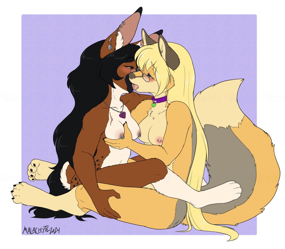 A digital colored art piece of two female anthro characters. The left character is a brown speckled rabbit, and is cradled in the lap of a gold furred vixen. They are open mouth kissing and groping each other, fully nude.