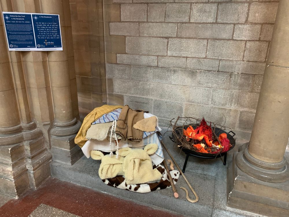 A pretend fire with clothes meant to belong to the shepherds