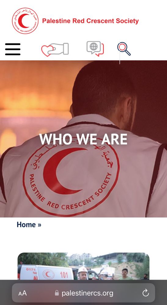 Man in white coat with Palestine Red Crescent Society logo. 