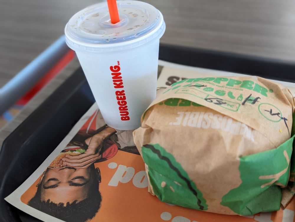 Photo of an Impossible Whopper and a soda from Burger King