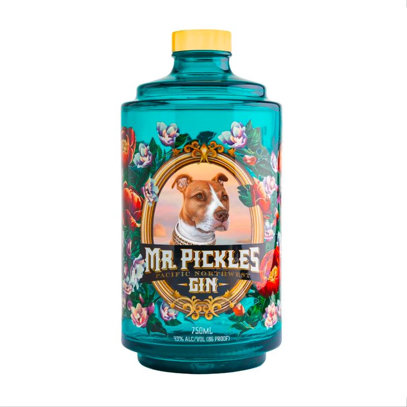 A beautiful aquamarine 750 ml bottle of gin with a picture of an American Pitbull Terrier surrounded by flowers. The bottle label says "Mr. Pickles Pacific Northwest Gin". 