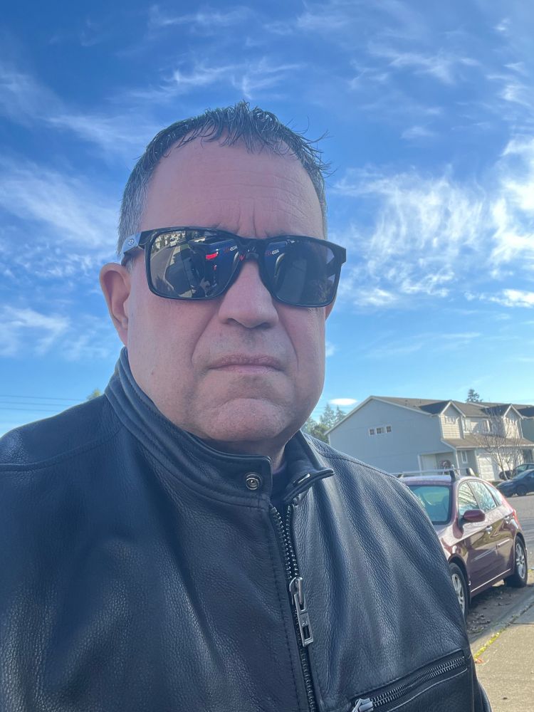 Picture of me in glasses and jacket 