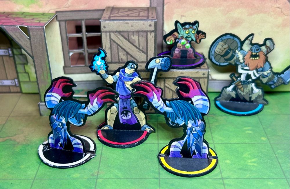 Paper minis of heroes battling undead