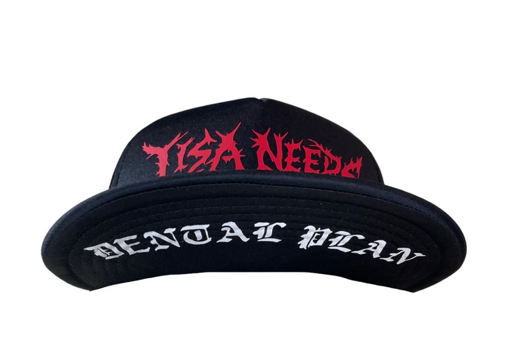 Under rim of the hat says “Dental Plan”
