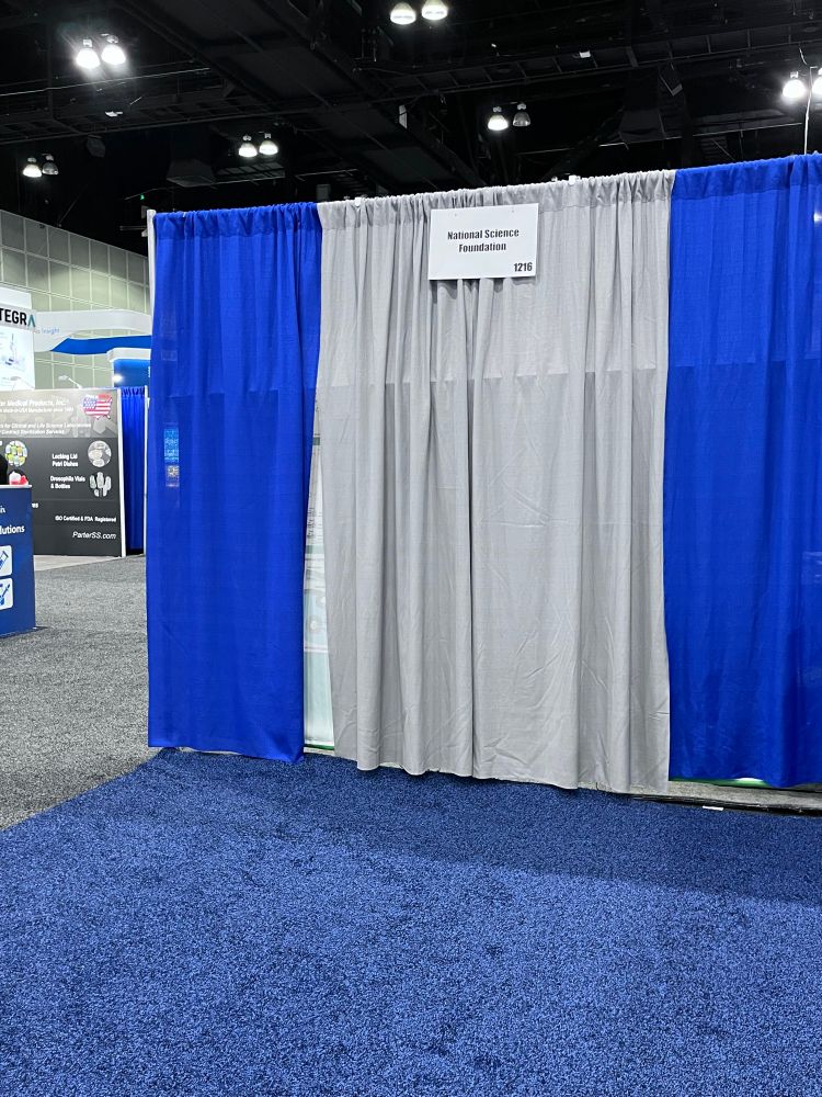 An empty booth at ASM that should have housed the NSF