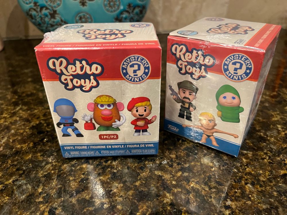 Two boxes of Funko blind boxed Retro Toys figures