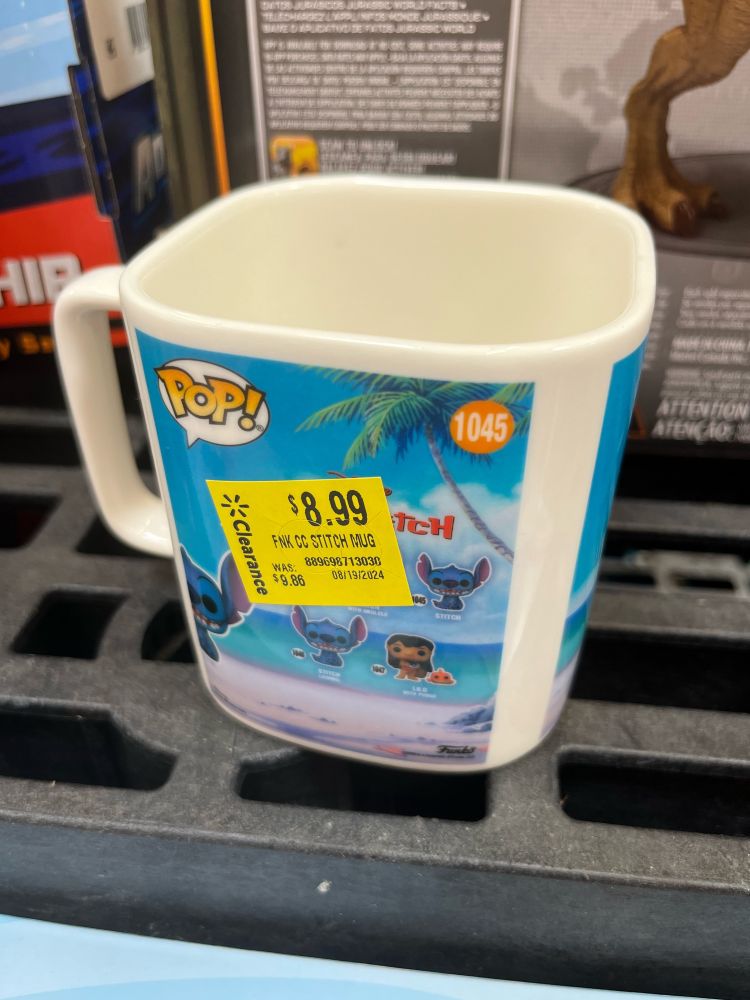 The back side of the same box, with a picture of the back of the POP box. Unseen is the side of the mug depicting the side of the box. The icing on the cake is the clearance tag showing that the price has been marked down by less than a dollar.