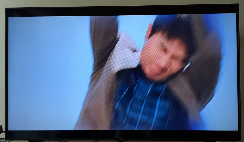 Still image from "The Devil Judge" of Professor Min trying to beat the shit out of Ga-on's motorbike with a golf club