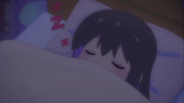 a cartoon girl is sleeping in a bed with a pillow that says a on it