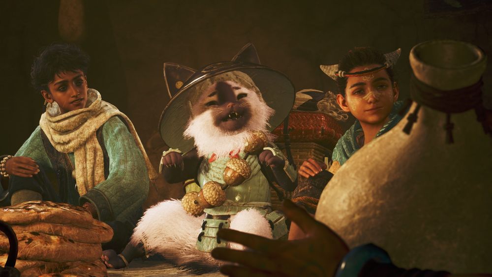 Three people sit at a meal: two children, and between them a pink, cat-like person known as a Felyne. She's very fluffy and smiling brightly.